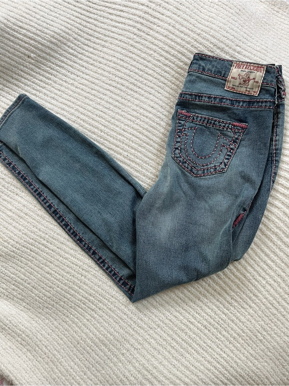 True Religion women's Faded Blue Skinny Jeans with Pink Stitching